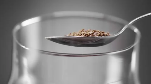 Coffee is poured from the spoon into the mug Stock Footage 151794226