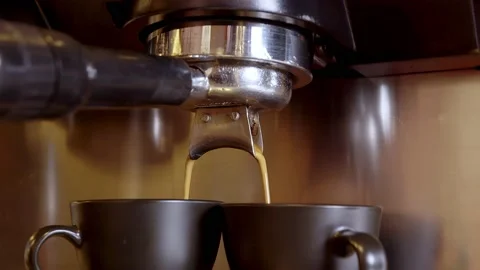 Coffee pouring in brown cups Stock Footage 218601719