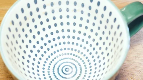Coffee pouring into a ceramic mug. Stock Footage 115305278