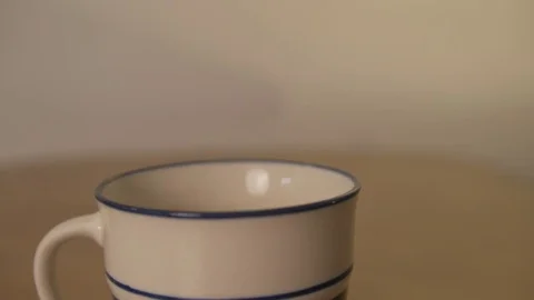 Coffee pouring into coffee cup Stock Footage 76250788