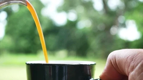 Coffee pouring cup close up Stock Footage 98351927