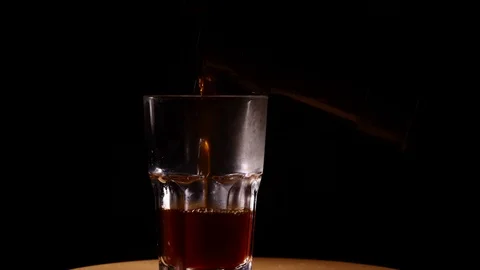 Coffee pouring in glass Stock Footage 84072857