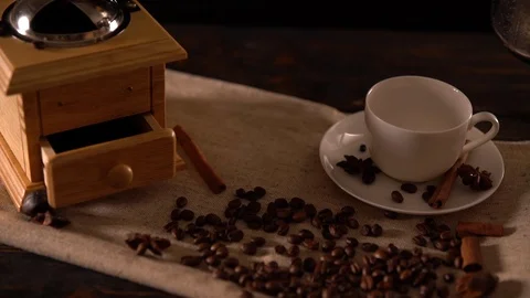 Coffee pouring into tiny white espresso mug Stock-Footage 94463030