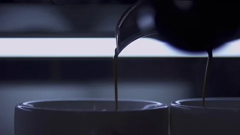 Coffee pours in slow motion Stock Footage 82731999