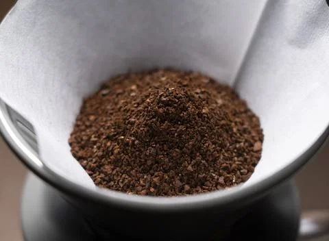 Coffee powder in a dripper Stock Photos