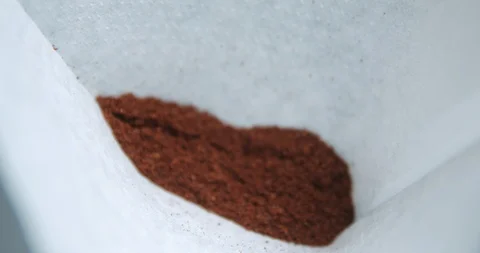 Coffee powder pouring in filter 4k Stock Footage 127403627