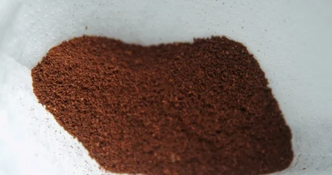 Coffee powder pouring in filter 4k Stock Footage 127403756