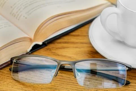 Coffee reading a book Stock Photos