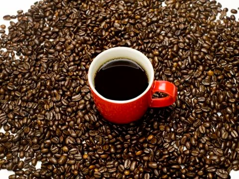Coffee in red mug Stock Photos