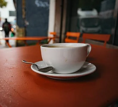 Coffee on a red table Foto stock