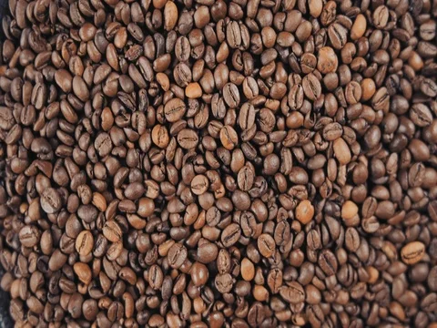 Coffee roasted beans are rotated. Slow motion Stock Footage 73671689