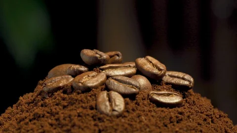 Coffee roasted beans on ground coffee and espresso coffee beans Stockbeeldmateriaal 128705483