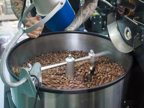 Coffee Roaster Batch of Beans Stock Photos