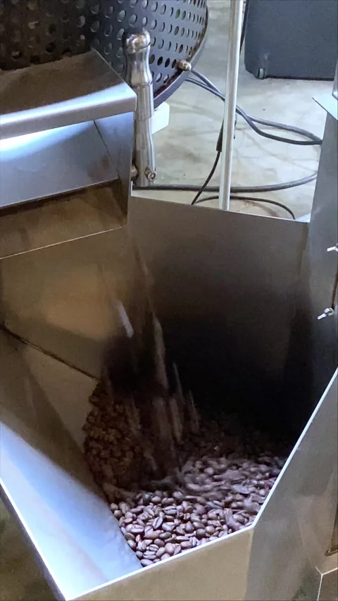 Coffee roaster, coffee grinder, and coffee beans Stock Footage 345417517