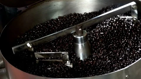 Coffee roaster cooling off fresh roasted coffee beans Batch of Beans in cylinder 스톡 동영상 334643774