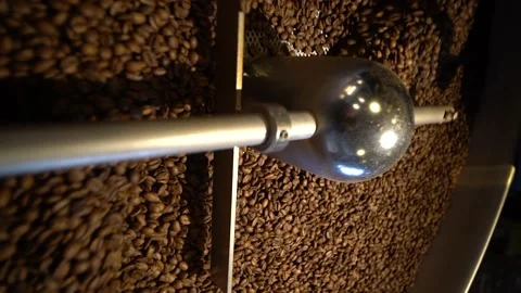 Coffee Roaster Machine At Coffee Roasting Process. Mixing Coffee Beans. Roasted Video stock 194357873
