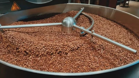 Coffee roaster machine at coffee roasting process. Mixing coffee beans.  Stock Footage 308008422