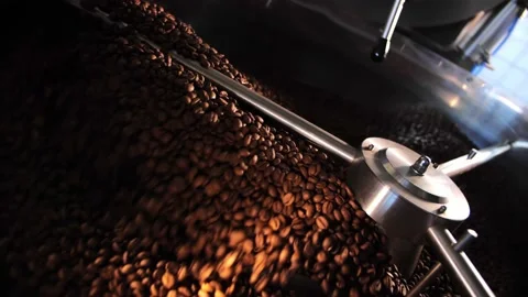 Coffee roaster machine mixing aroma beans.Preparation fresh aroma caffeine on Stock Footage 214342561