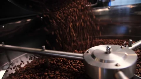 Coffee roaster machine mixing aroma beans.Preparation fresh aroma caffeine on Stock Footage 214342854