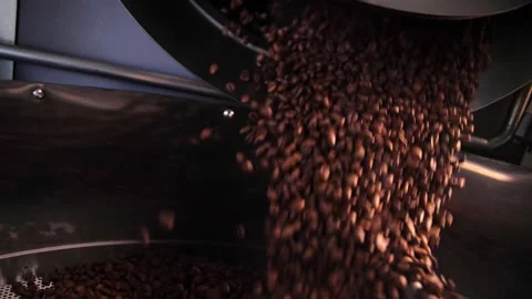 Coffee roaster machine mixing aroma beans.Preparation fresh aroma caffeine on Stock Footage 214342962