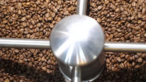 Coffee roaster machine mixing coffee beans in slow motion Stock Footage 168994459