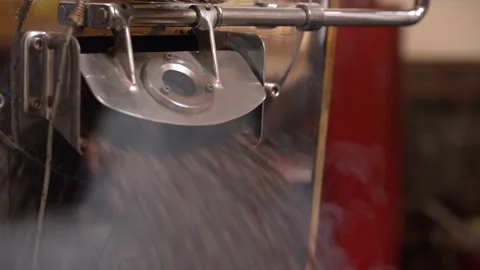 Coffee roaster opening and beans falling out Video stock 238006997