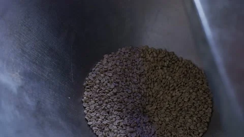 Coffee roaster, the process of roasting coffee in the oven. Stock Footage 149028638