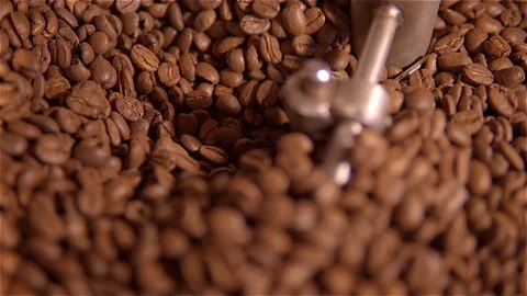 Coffee roaster .VAT for roasting coffee beans. roaster. Coffee beans in the Stock Footage 99740692