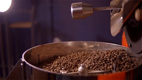 Coffee roaster .VAT for roasting coffee beans. roaster. Coffee beans in the Stock Footage 99740754