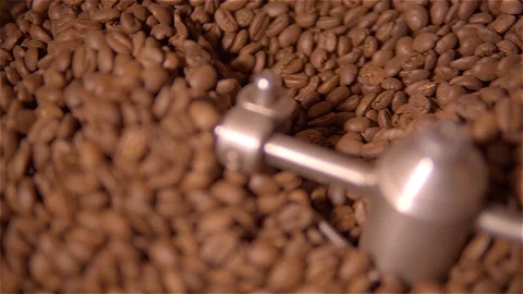 Coffee roaster .VAT for roasting coffee beans. roaster. Coffee beans in the Stock Footage 99744238