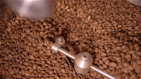 Coffee roaster .VAT for roasting coffee beans. roaster. Coffee beans in the Stock Footage 99745607
