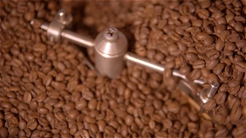 Coffee roaster .VAT for roasting coffee beans. roaster. Coffee beans in the Stock Footage 99748939
