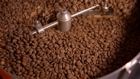 Coffee roaster .VAT for roasting coffee beans. roaster. Coffee beans in the Stock Footage 99748970