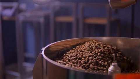 Coffee roaster .VAT for roasting coffee beans. roaster. Coffee beans in the Stock Footage 99750656