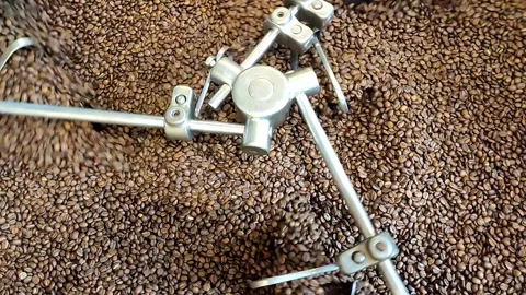 Coffee roasting machine in action Stock Footage 312253945