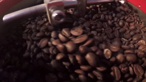 Coffee Roasting Machine Mixing Hot Roasted Coffee Beans Stock Footage