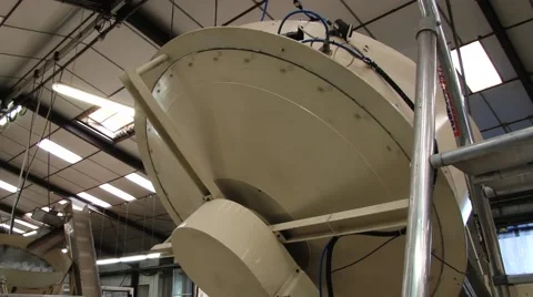 Coffee roasting machine rotates at a factory in Grasse, France. Stock Footage 61394348