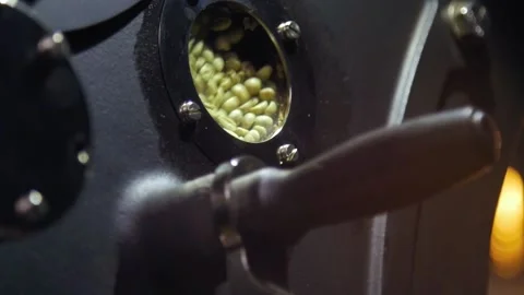 Coffee roasting machine slow motion Stockbeeldmateriaal 144890722