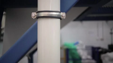 At a coffee roasting plant. The machine is in the process of roasting coffee. Video stock 220679140