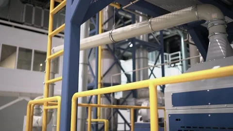 At a coffee roasting plant. The machine is in the process of roasting coffee. Ro Video stock 220682750