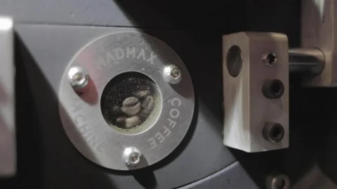 Coffee roasting process in the oven Stock Footage 143383895