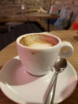 Coffee on Saucer with Spoon Stock Photos