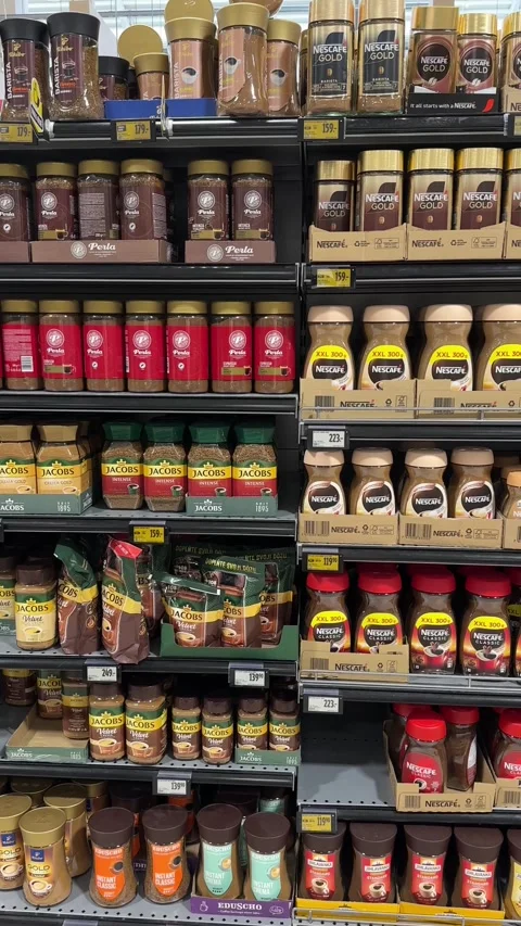 Coffee selection in a store, many different kinds of instant and arabica coffee Stock Footage 280640615