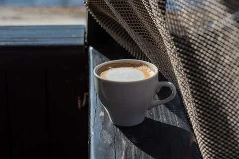 Coffee selective focus. White cup with cappuccino, coffee, morning, cheerfuln Stock Photos