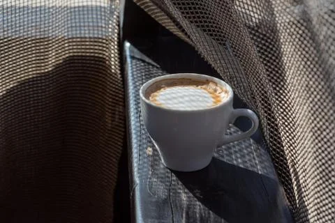 Coffee selective focus. White cup with cappuccino, coffee, morning, cheerfuln Stock Photos