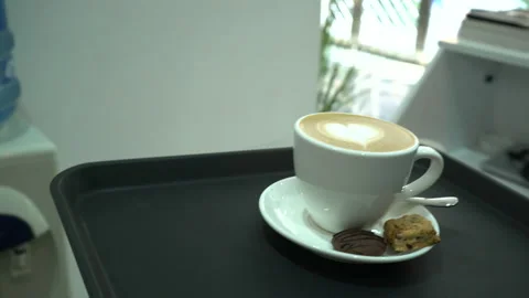 Coffee is served on the table Stock Footage 229859597