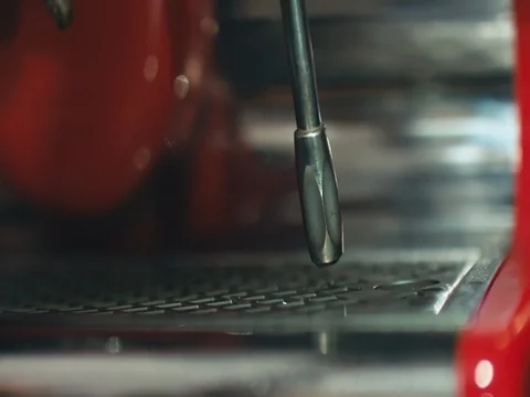 Coffee shop barista activating espresso machine steam wand Stock Footage