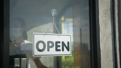 Coffee shop concept of 4k Resolution. The waitress is opening a coffee shop i Stock Footage 147564529