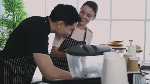 Coffee shop concept of 4k Resolution. The barista makes latte art with the .. Stock Footage 238484327