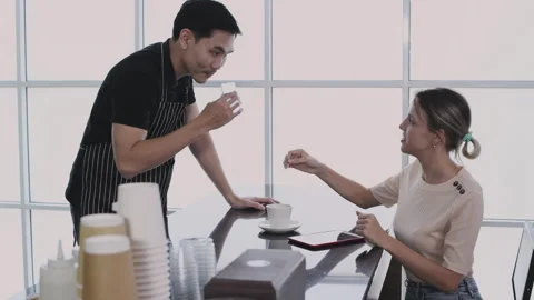 Coffee shop concept of 4k Resolution. The barista is introducing coffee bea.. Stock Footage 243629175